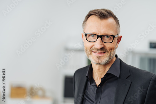 Middle-aged businessman wearing glasses