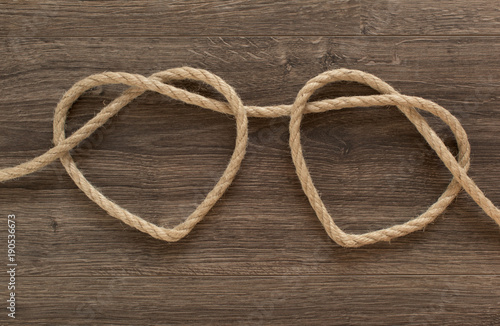 Two heart ropes connected to a knot