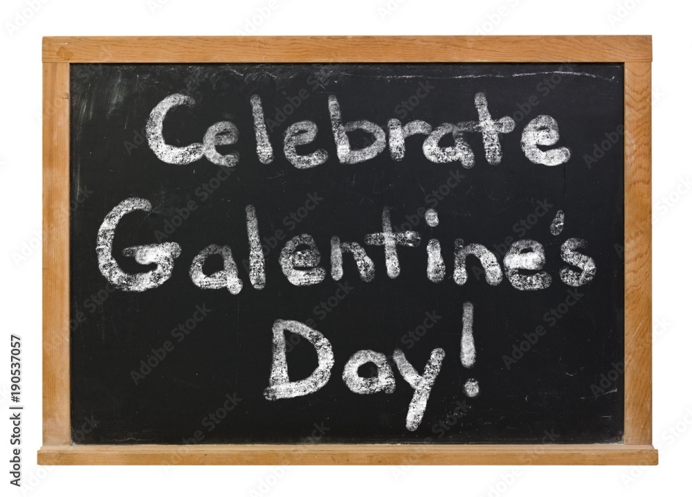 Obraz premium Celebrate Galentine's Day written in white chalk on a black chalkboard isolated on white