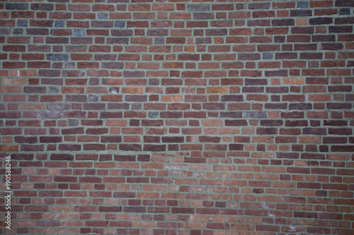 texture of a wall made of red bricks with a white mortar
