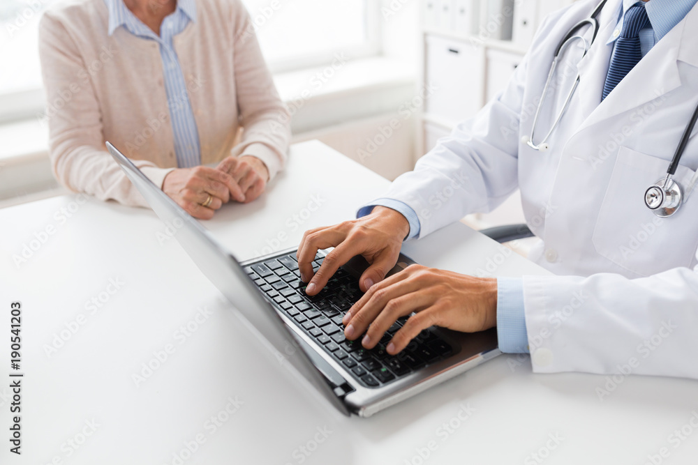 senior woman and doctor with laptop at hospital senior woman and doctor with laptop at hospital