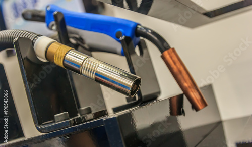  Mig welding gun and welding tools. close up
