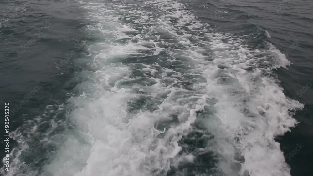 Wake of speed boat.Powerful waves pulled out from fast moving boat, Wake of speed boat.Powerful waves pulled out from fast moving boat,