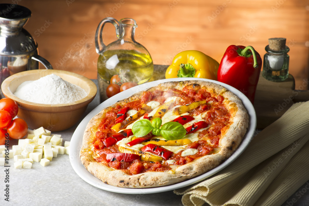 Pizza with peppers on the table Pizza with peppers on the table
