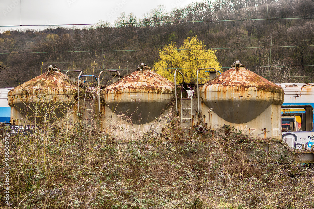 Fototapeta premium Belgrade, Serbia March 21, 2016: Abandoned and destroyed trains