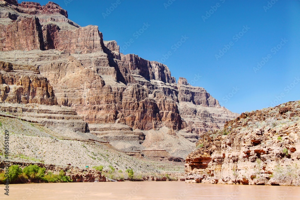 Gorgeous view on Colorado river, Grand Canyon, Arizona . Blue sky background. Beautiful nature landscape backgrounds.