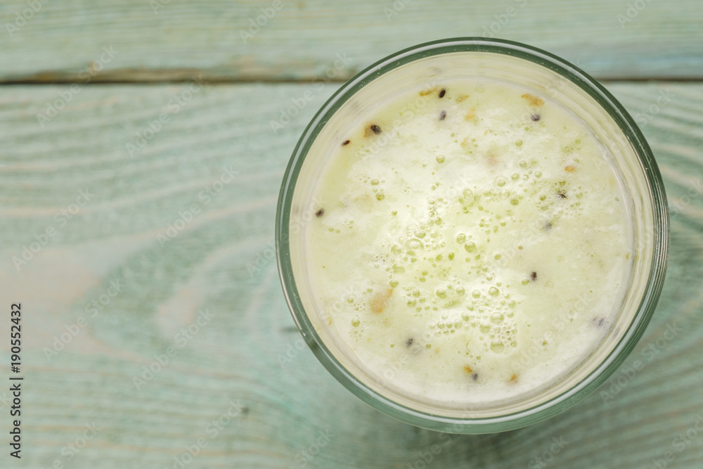 Glass with kiwi smoothies, top view Glass with kiwi smoothies, top view