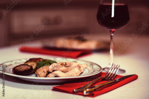 Romantic dinner with wine  meat and vegetables