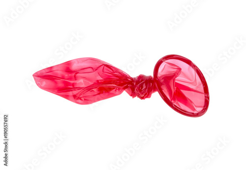 Obraz na plátne condom used knotted on knot isolated on white background