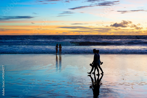 Romantic couple walk  beach...