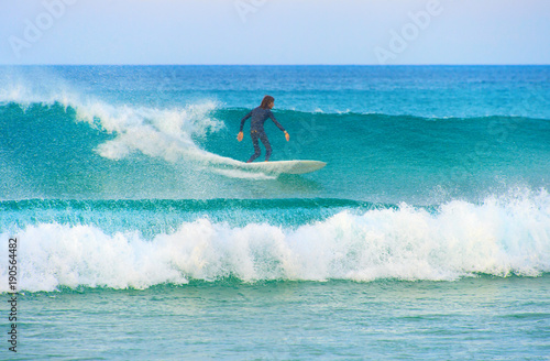 Photography Surfer surfing on a wave