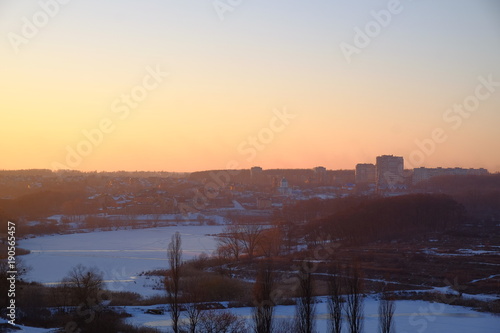 Fototapeta Naklejka Na Ścianę i Meble -  sunset above the old highs, winter
