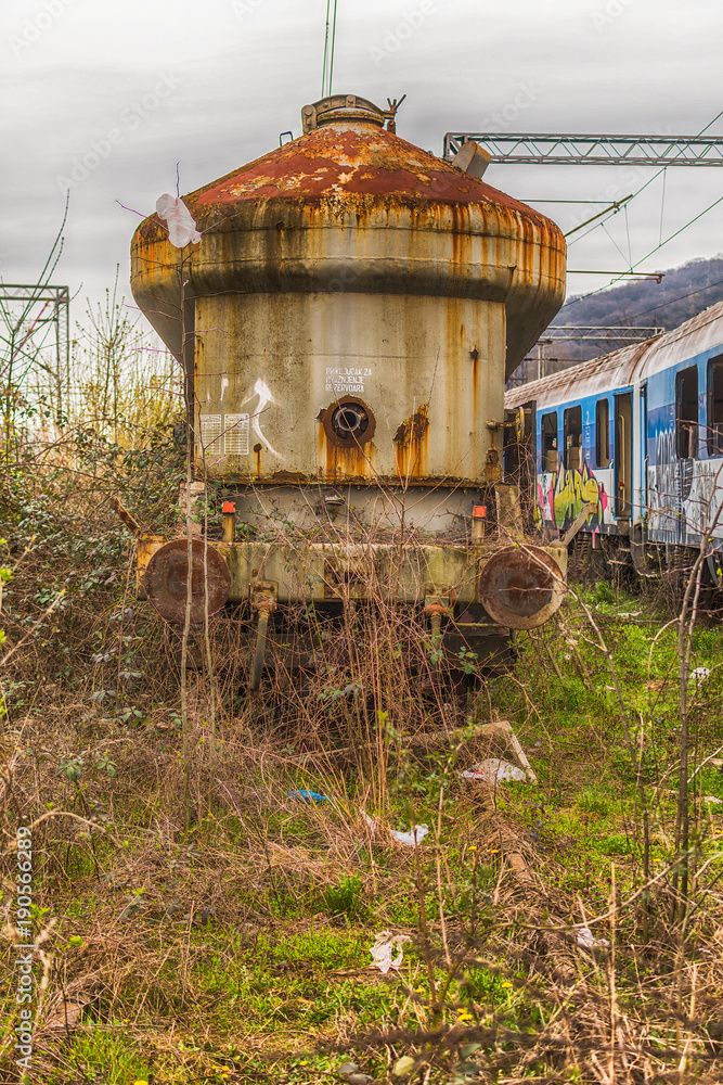 Fototapeta premium Belgrade, Serbia March 21, 2016: Abandoned and destroyed trains