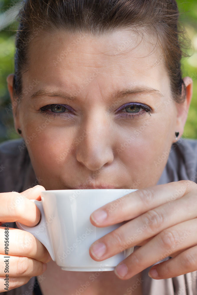 woman with a cup woman with a cup