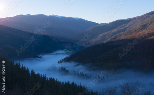 Mist of sea  Sea of clouds on sunrise with ray lighting in valley of Goizueta