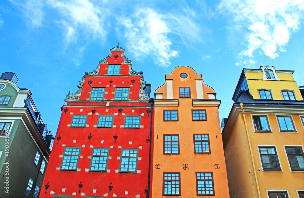 Red and Yellow iconic buildings on Stortorget, a small public square in Gamla Stan, the old town in central Stockholm, Sweden