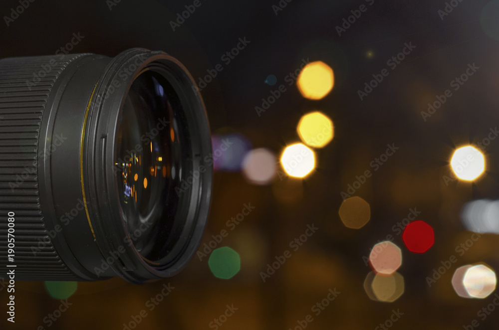glass lens on the background of the night bokeh