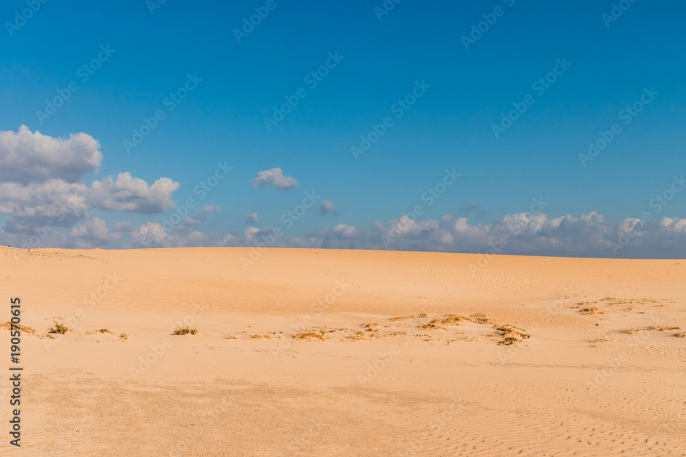Clouds over the Corralejo sand dunes in Fuerteventura, Canary Islands Clouds over the Corralejo sand dunes in Fuerteventura, Canary Islands