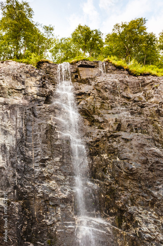 Little waterfall in mountains  Norway.