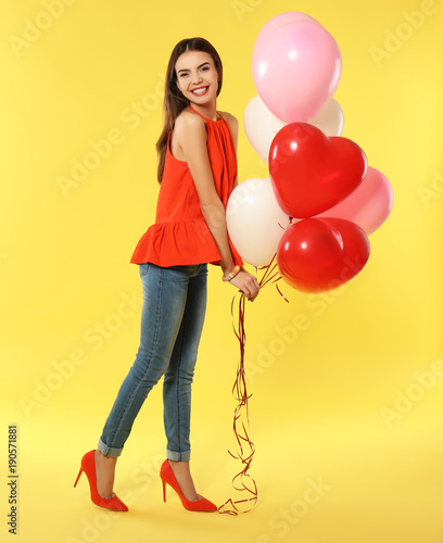 Romantic young woman with h...
