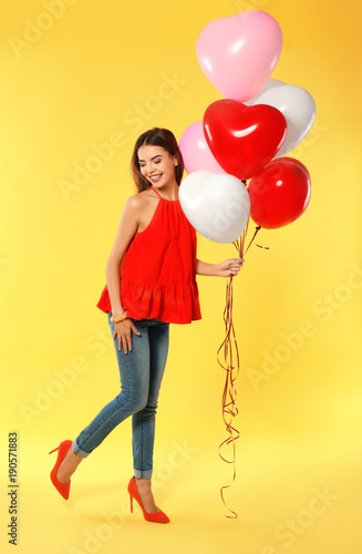 Romantic young woman with h...