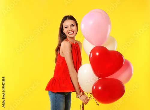 Romantic young woman with h...