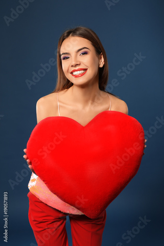 Romantic young woman with h...