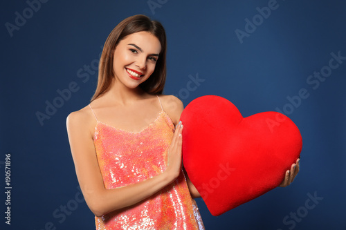 Romantic young woman with h...