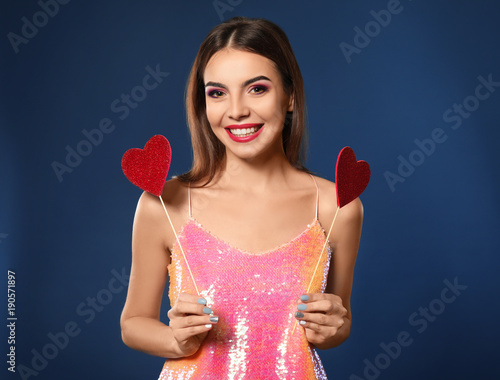 Romantic young woman with p...