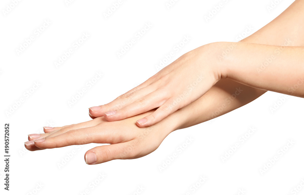 Hands of young woman with healthy skin softened by cream with moisturizing effect, on white background