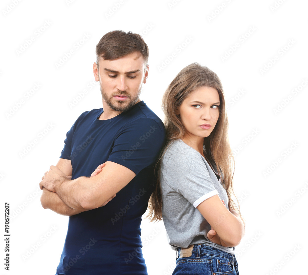 Unhappy young couple on white background. Problems in relationship Unhappy young couple on white background. Problems in relationship
