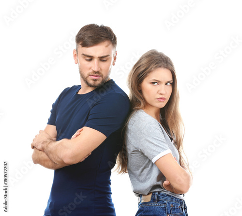 Unhappy young couple on white background. Problems in relationship