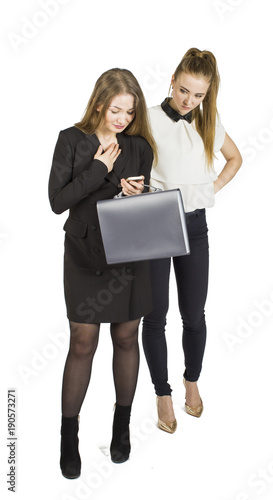 Beauty blonde businesswomen holding documents and interacting. Concept of teamwork.