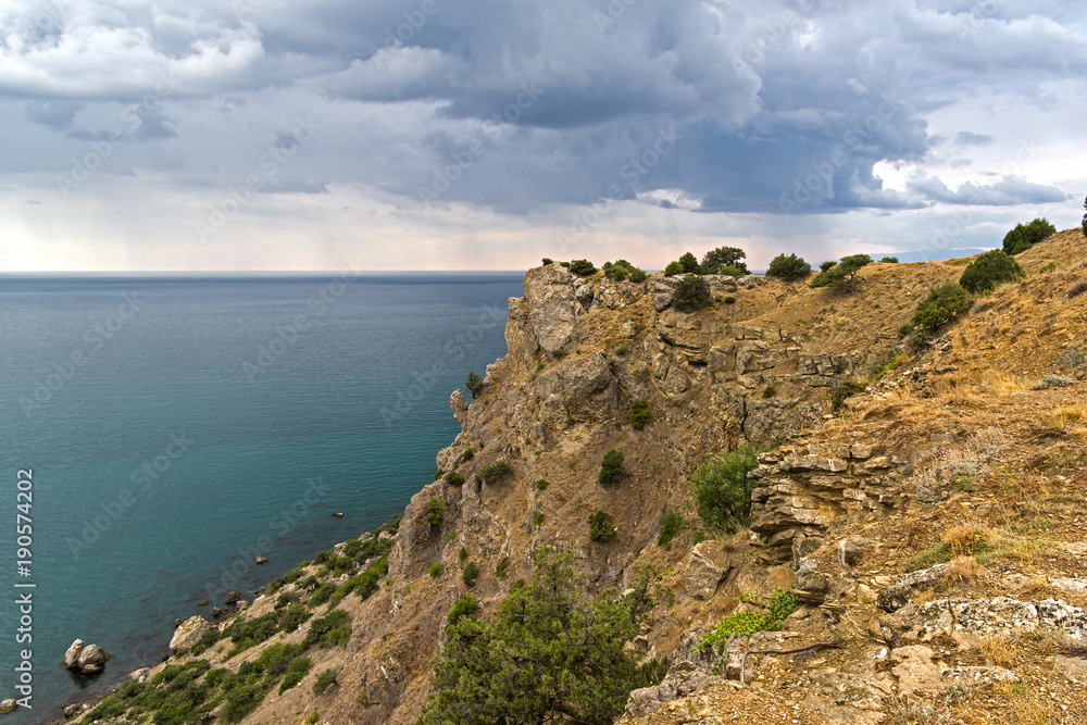 View from the top of the mountain towards the sea. Bad weather. Crimea.