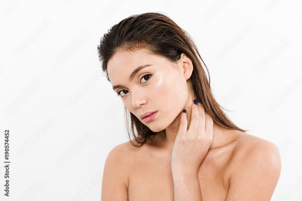 Portrait of beautiful asian woman after bath with wet brown hair looking on camera, isolated over white background Portrait of beautiful asian woman after bath with wet brown hair looking on camera, isolated over white background