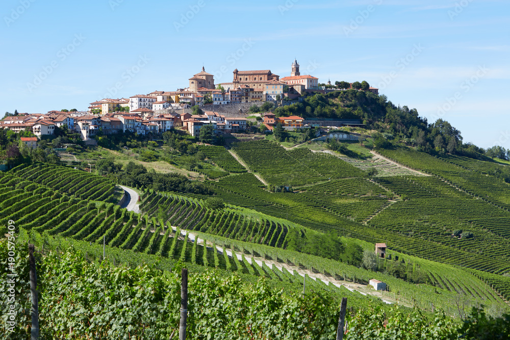 La Morra town in Italy surrounded by vineyards in a sunny day