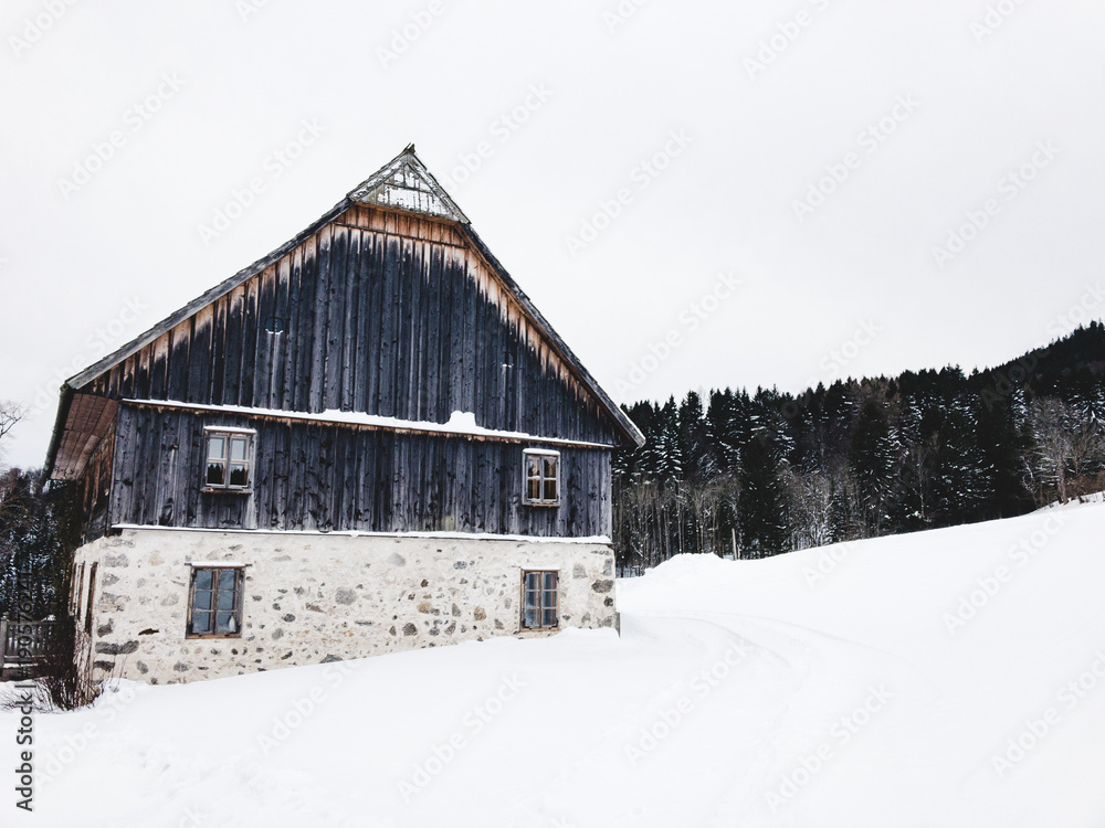 snowed in country house in winter in the mountains snowed in country house in winter in the mountains