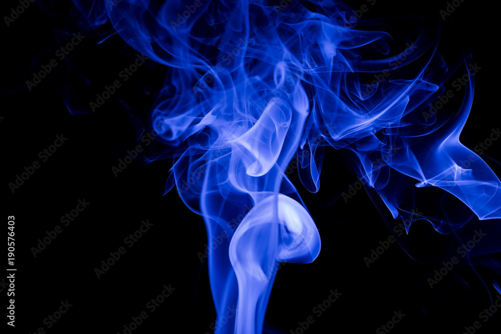 Obraz premium Blue smoke on black background