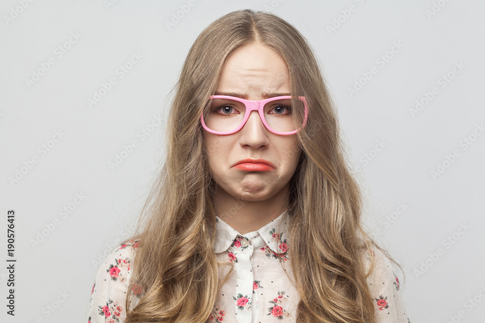Portrait of unhappy beautiful girl, looking ay camera and cry Portrait of unhappy beautiful girl, looking ay camera and cry