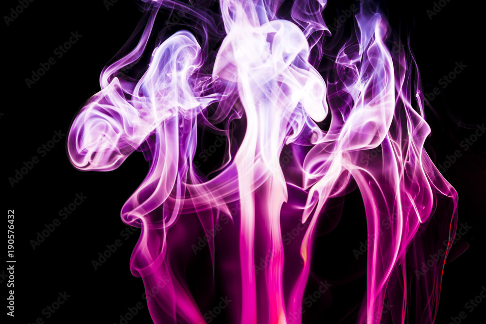 Obraz premium Colored smoke on black background