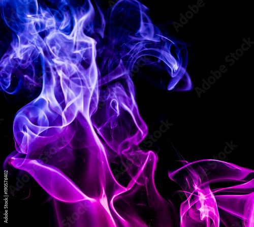 Colored smoke on black background