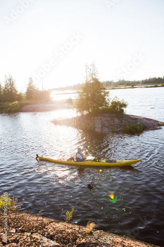 Senior Mature Woman Sea Kayaking