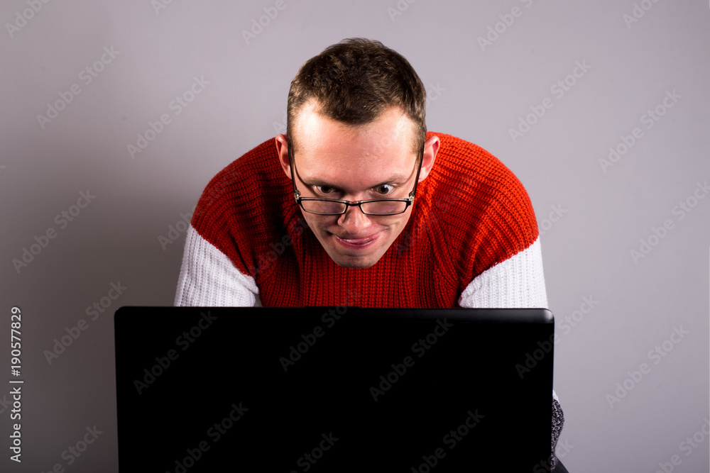 Hacker in front of his computer. Hacker in front of his computer.