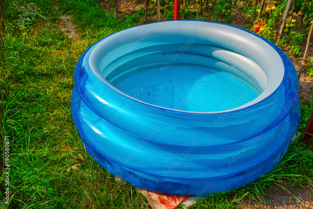 Plastic pool in a summer day outdoors