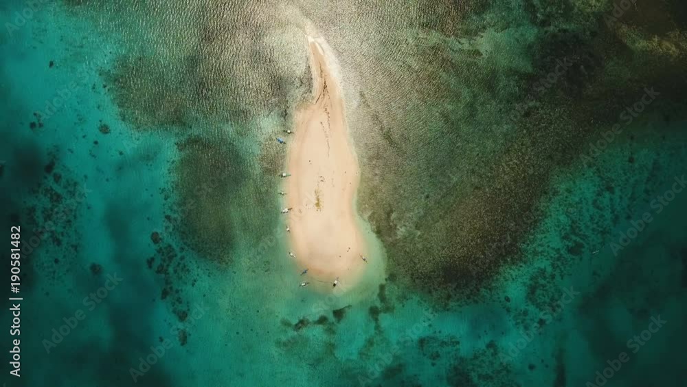 Aerial view of beautiful sand tropical island with white sand beach and tourists. White sand island. Seascape: ocean and beautiful beach paradise. Philippines, Siargao. 4K video. Travel concept Aerial view of beautiful sand tropical island with white sand beach and tourists. White sand island. Seascape: ocean and beautiful beach paradise. Philippines, Siargao. 4K video. Travel concept
