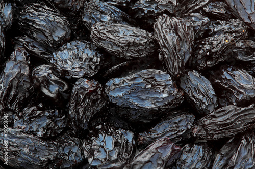 Close-up of dark raisins currant . Top view point.Black raisins texture