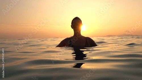 Wallpaper Mural Silhouette of sexy woman standing during sunset in sea, super slow motion 240fps 
 Torontodigital.ca