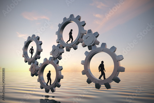 Φωτογραφία Gears of teamwork at sea at sunset
