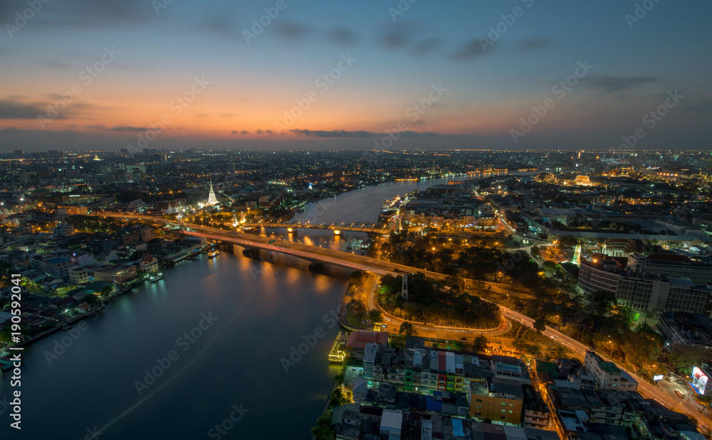 Sunset Scene with Phra Phuttha Yodfa Bridge, Memorial Bridge and Chao Praya River in Bangkok