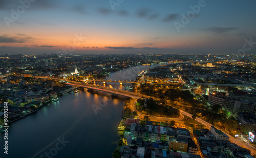 Sunset Scene with Phra Phuttha Yodfa Bridge, Memorial Bridge and Chao Praya River in Bangkok © aee_werawan